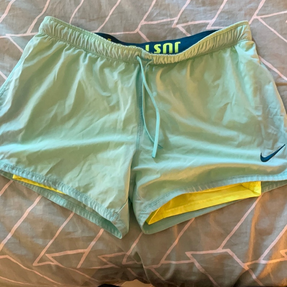 Nike Dri-Fit medium mint athletic shorts.
